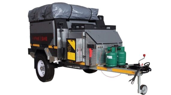 Conqueror Compact Platinum Edition trailer front and left side view with rooftop tent and gas bottles.