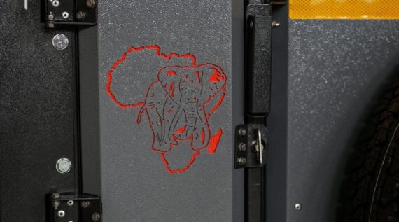 Sturdy construction of the Conqueror Compact Platinum Edition trailer with the Conqueror logo on the door.